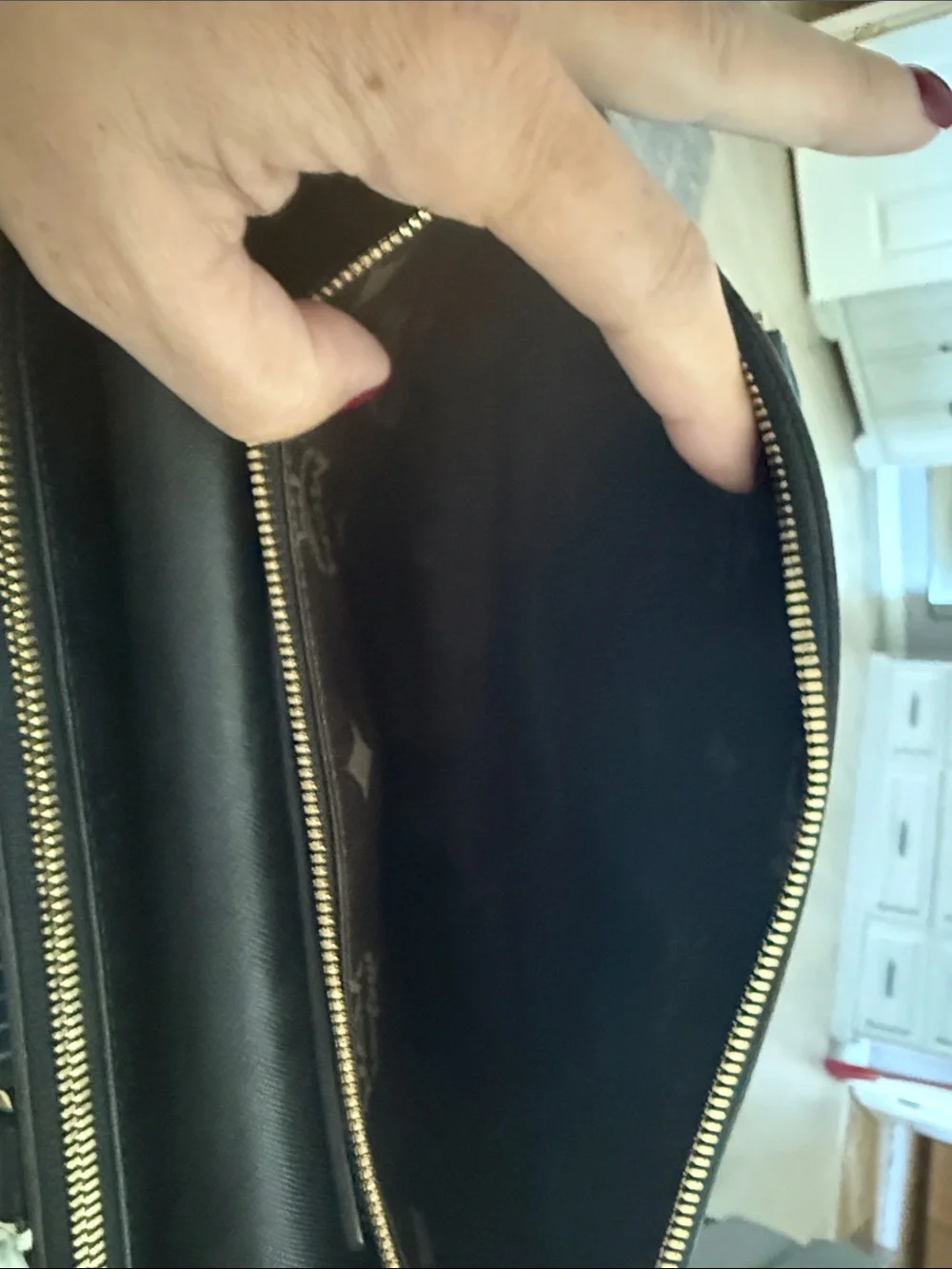 MCM Black Leather Shoulder Bag with Gold Logo Plate